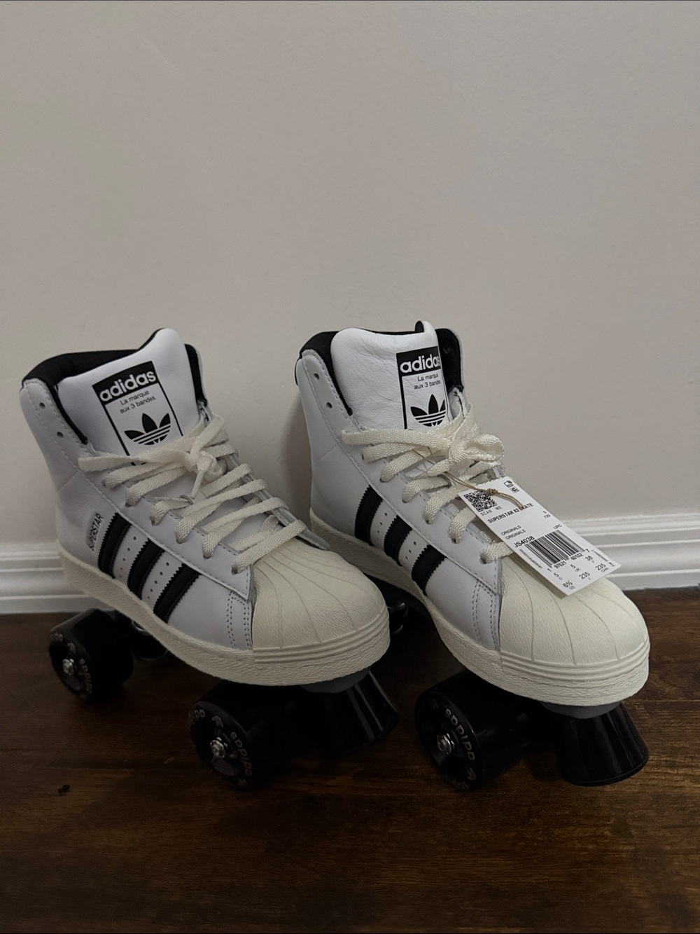 adidas White and Black High-Top Roller Skates